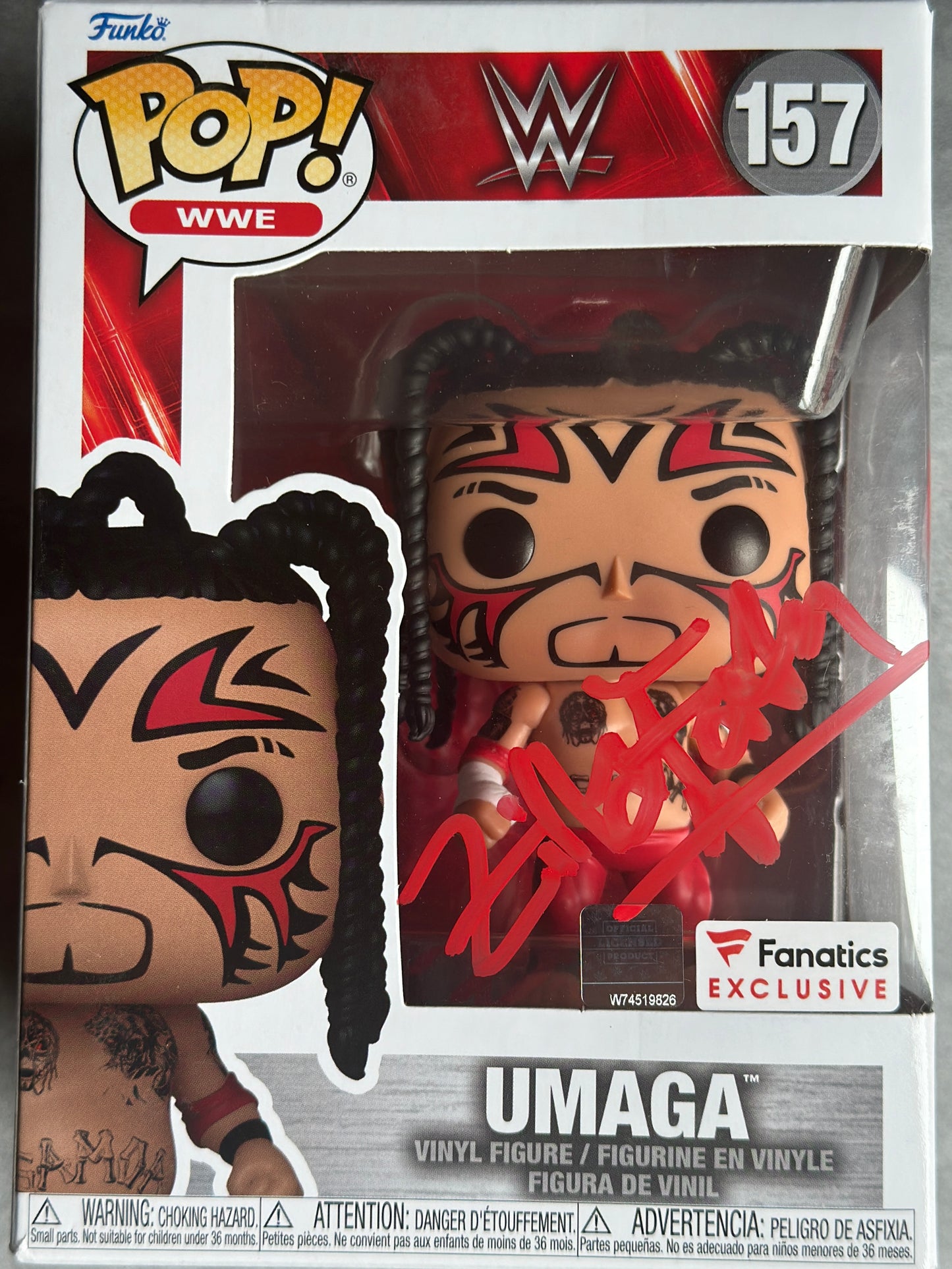 AUTOGRAPHED UMAGA VINYL FIGURE ( SIGNED BY ZILLA FATU)